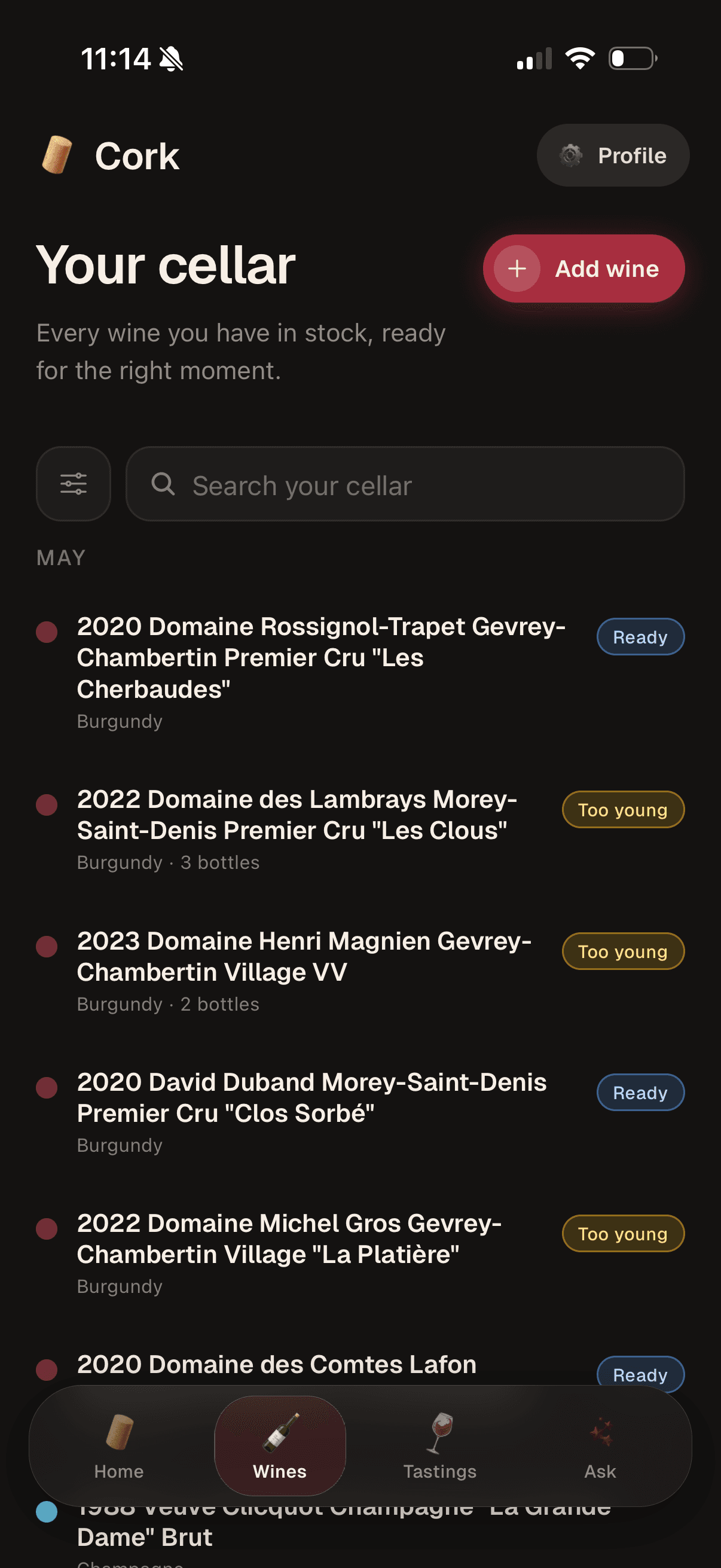 Cork cellar view showing Burgundy wines with their drinking-window status